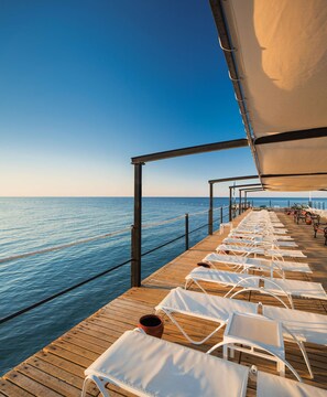 Private beach, sun-loungers, beach umbrellas, beach towels