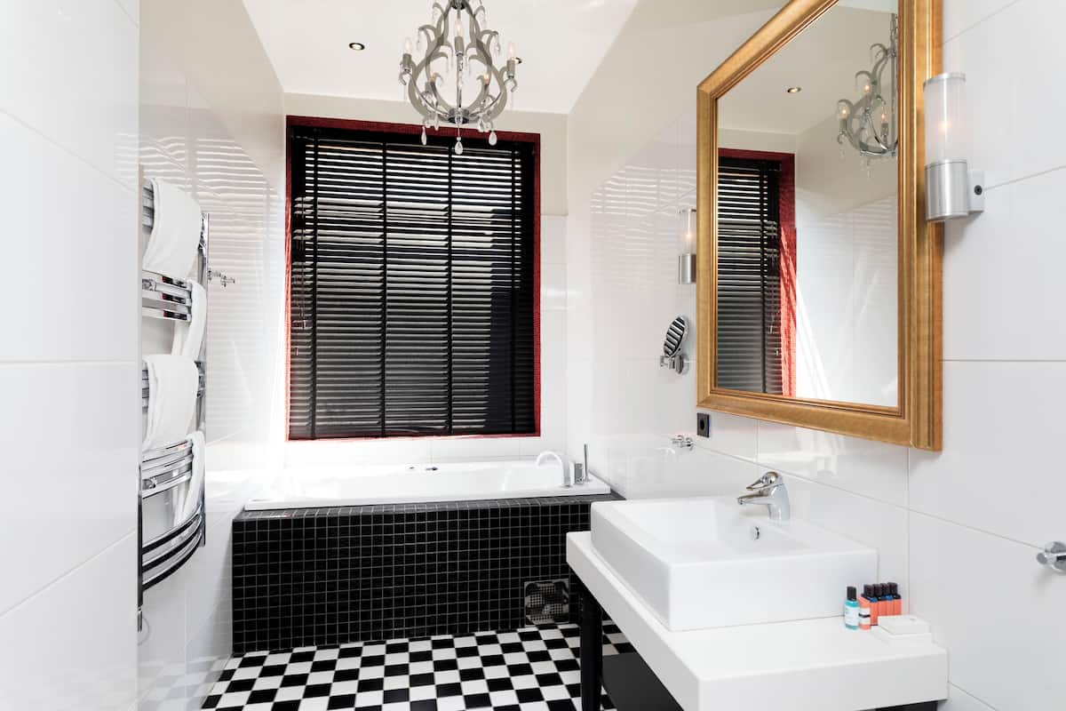 suite | bathroom | shower, rainfall showerhead, eco-friendly toiletries, hair dryer