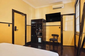 Premium bedding, pillow-top beds, laptop workspace, blackout curtains