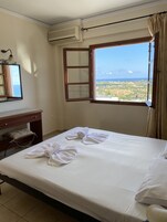 Premium bedding, desk, blackout drapes, soundproofing