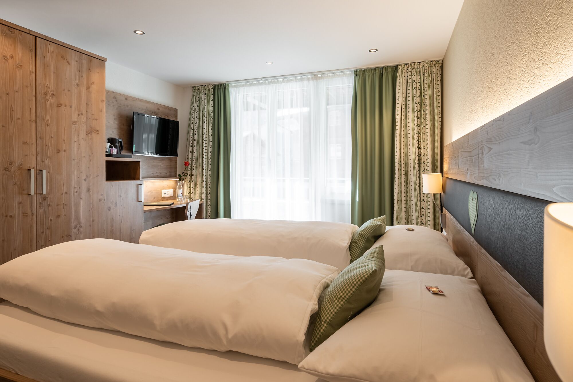 standard double room | premium bedding, down duvets, in-room safe, desk