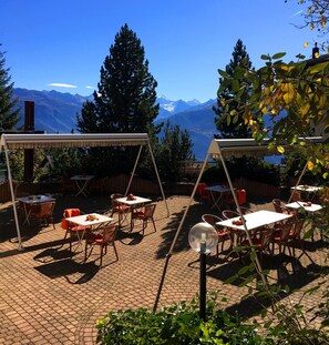 Relax in a casual dining atmosphere on our patio, surrounded by breathtaking mountain views.