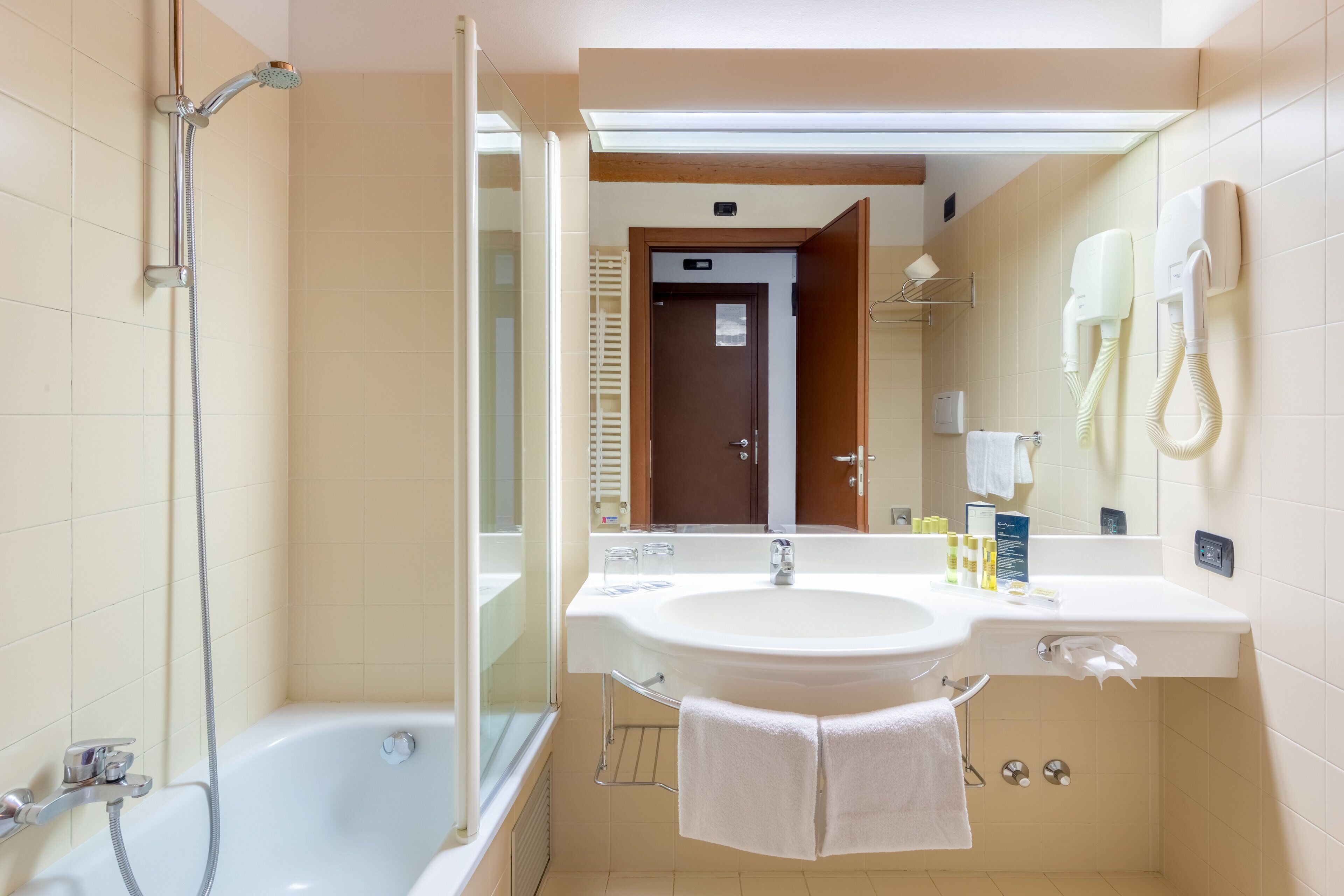 eco-friendly toiletries, hair dryer, bidet, towels