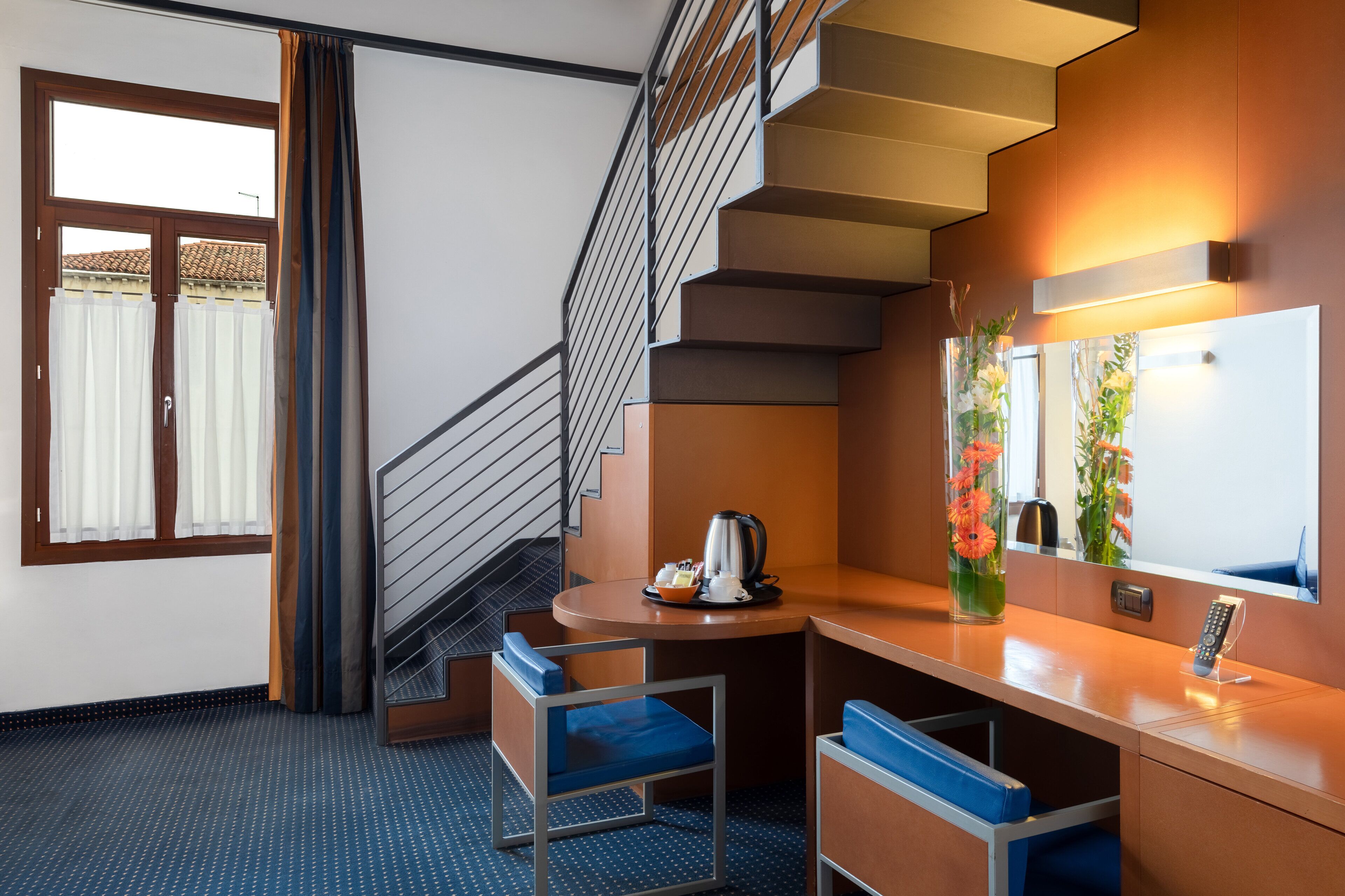 premium bedding, down duvets, minibar, in-room safe