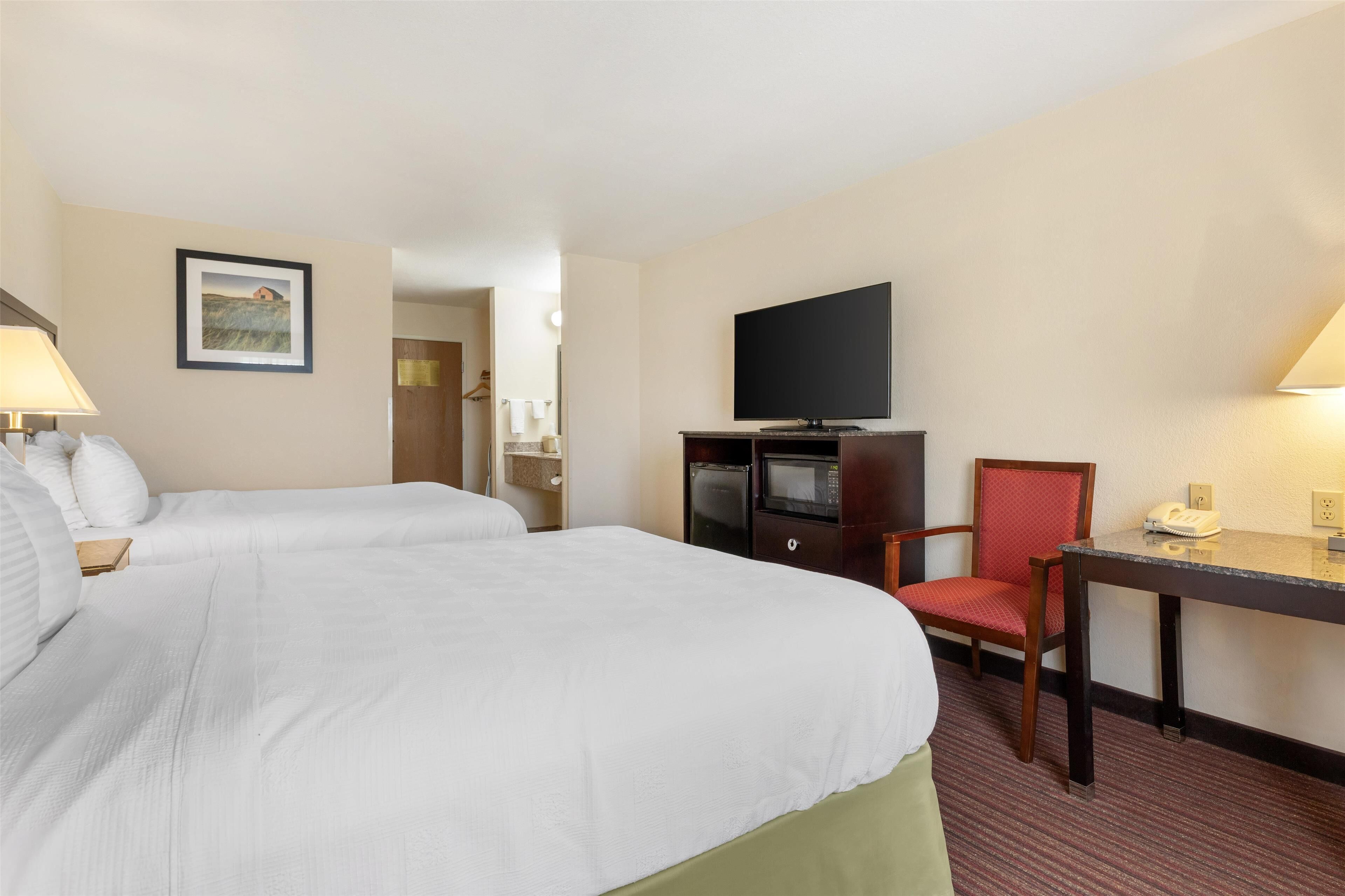 standard room, 2 queen beds, non smoking | desk, iron/ironing board, free cots/infant beds, wifi