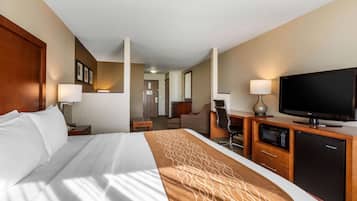 Suite, 1 King Bed with Sofa bed, Non Smoking | Laptop workspace, blackout drapes, iron/ironing board