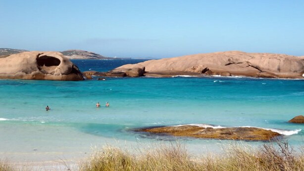 A coastal landscape with large rock formations and clear turquoise water. - Comfort Inn Bay Of Isles (Esperance)