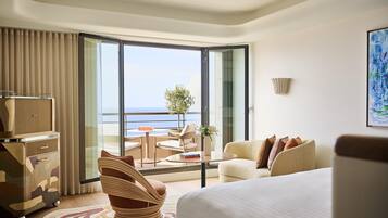 Room, 1 King Bed, Sea View | 1 bedroom, premium bedding, pillow-top beds, minibar
