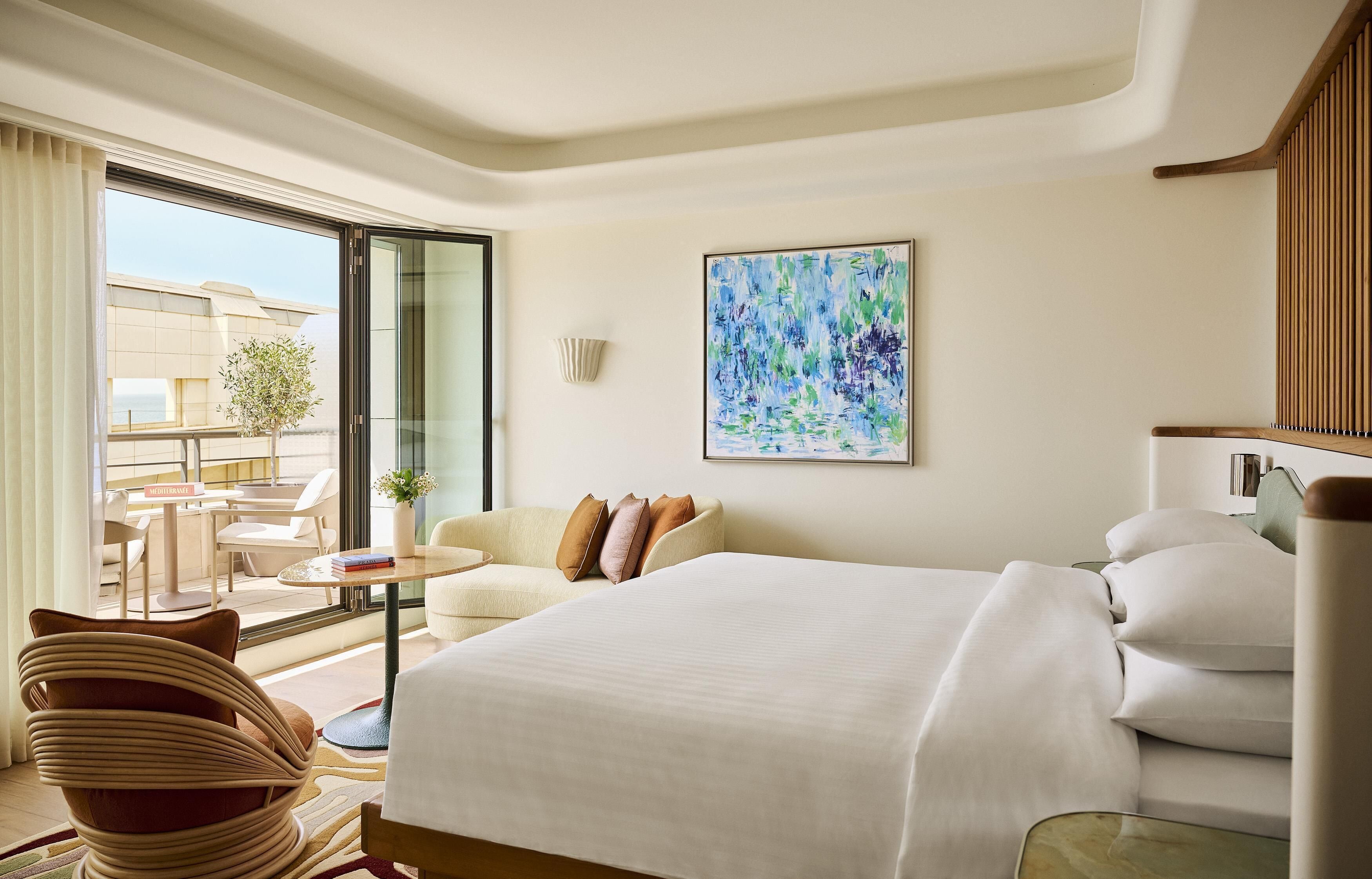 Room, 1 King Bed, Partial Sea View | 1 bedroom, premium bedding, pillow-top beds, minibar