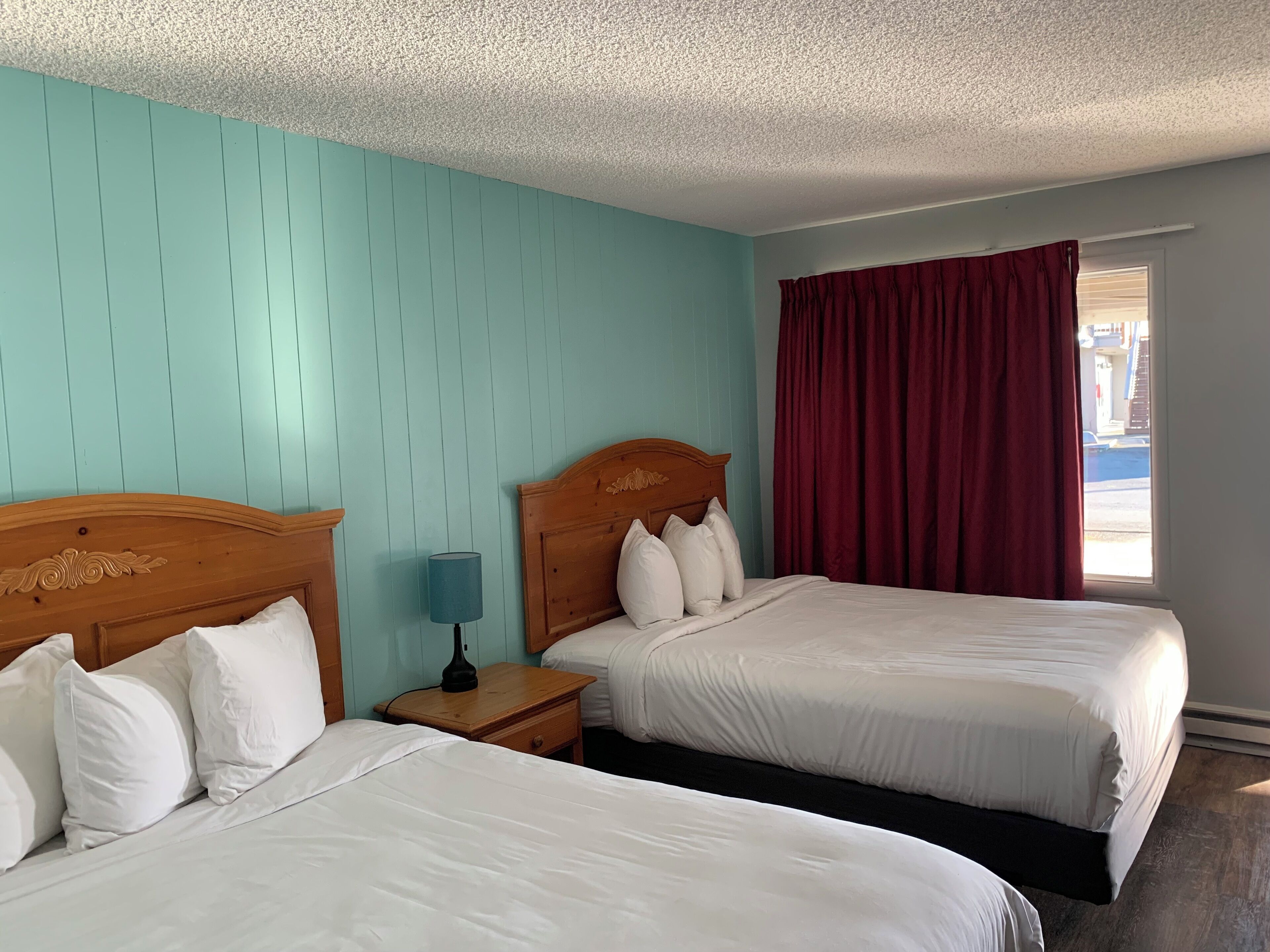 Standard Room, 2 Queen Beds | Iron/ironing board, free WiFi, bed sheets