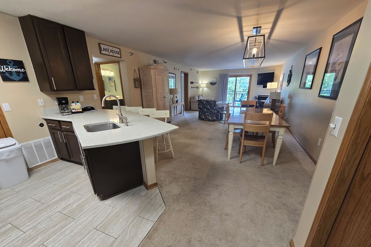 Suite, 2 Bedrooms | Living area | 40-inch flat-screen TV with cable channels, fireplace