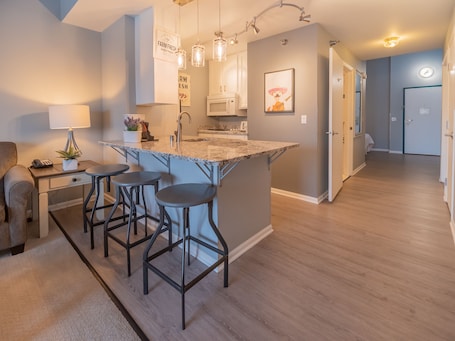 Belle Loft Suite with 2 Queen Beds | Private kitchen | Full-size fridge, microwave, stovetop, dishwasher. The Cove Of Lake Geneva