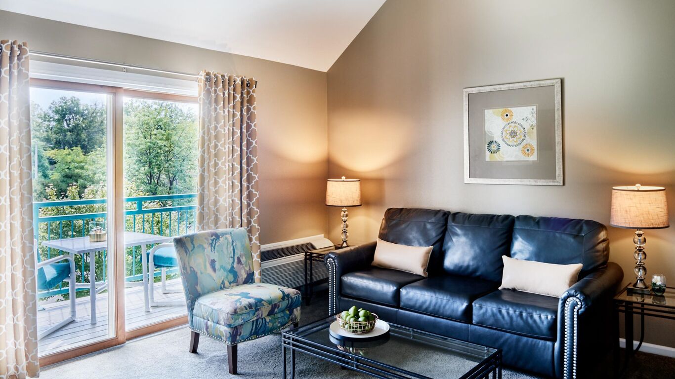 suite (belle loft) | living area | flat-screen tv, fireplace, dvd player