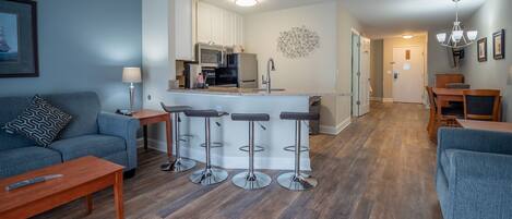 Anchor Suite Standard View | Living area | 40-inch flat-screen TV with cable channels, fireplace