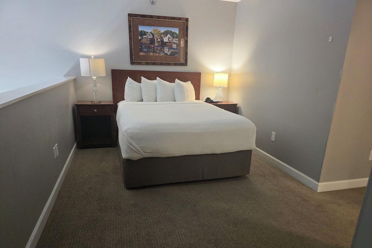 Dover Loft Pool View | Premium bedding, iron/ironing board, individually decorated