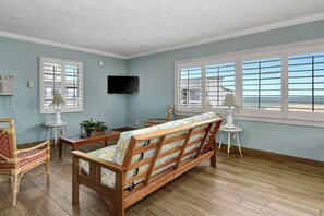 Apartment, 1 Bedroom, Kitchen, Ocean View | Living area | 32-inch LED TV with cable channels, TV, DVD player