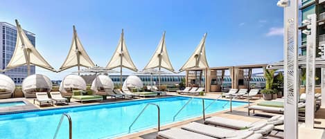 Outdoor pool, open 5:00 AM to 10:00 PM, cabanas (surcharge)