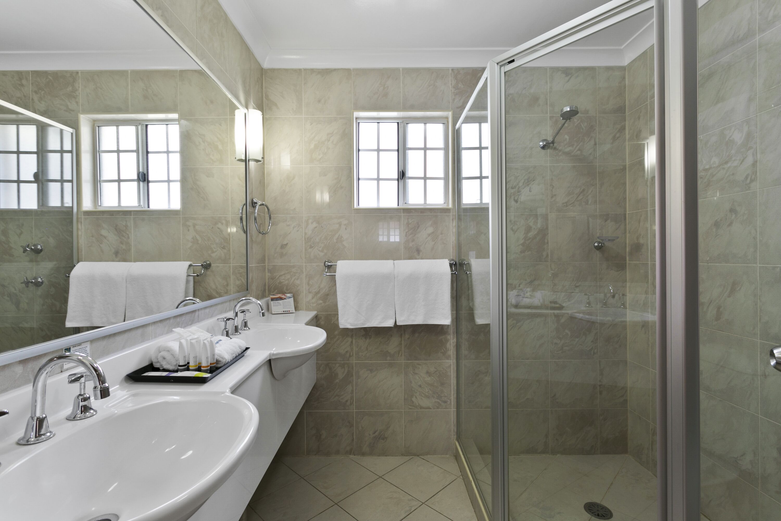 shower, free toiletries, hair dryer, towels