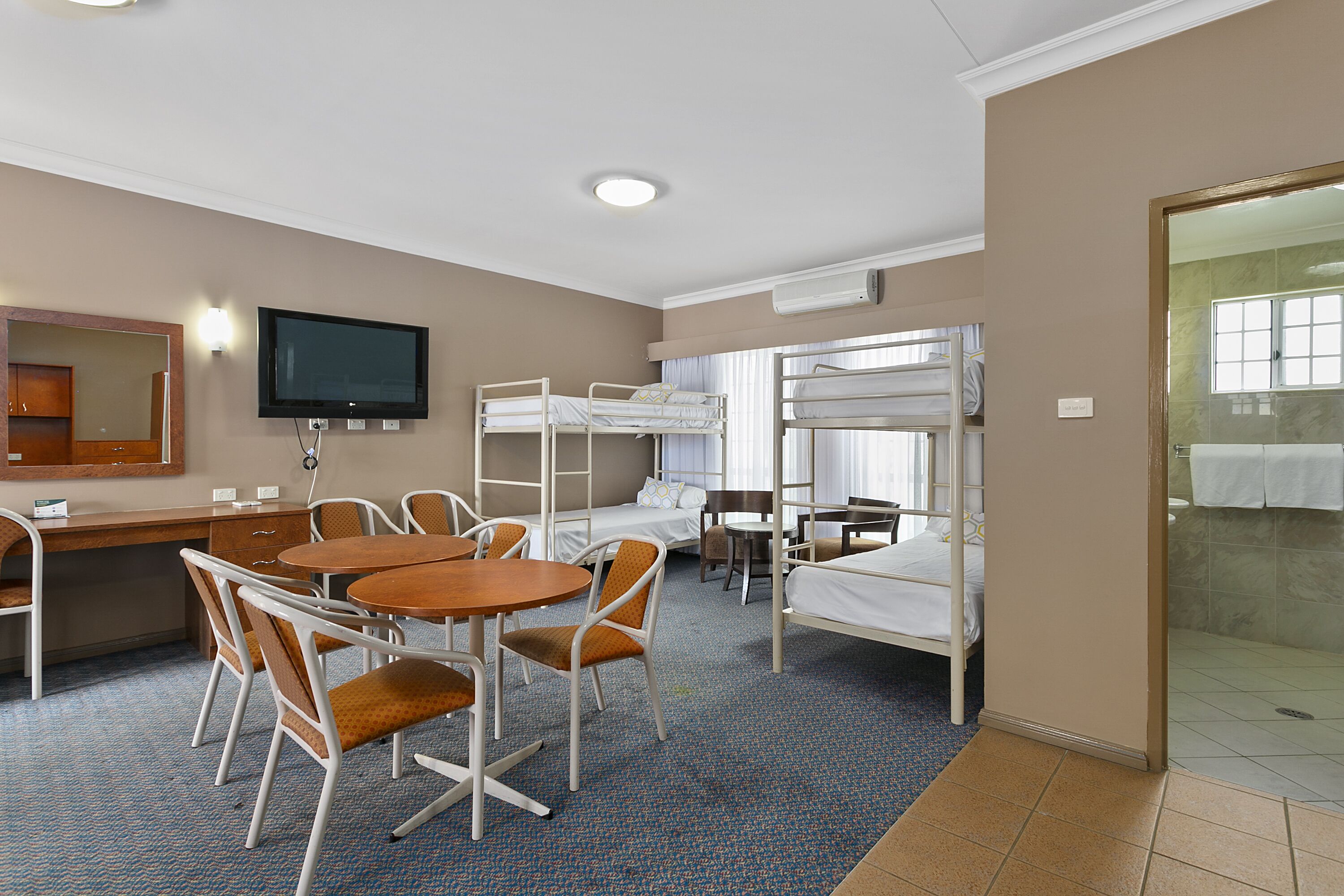 standard room, multiple beds, non smoking | in-room safe, desk, laptop workspace, iron/ironing board