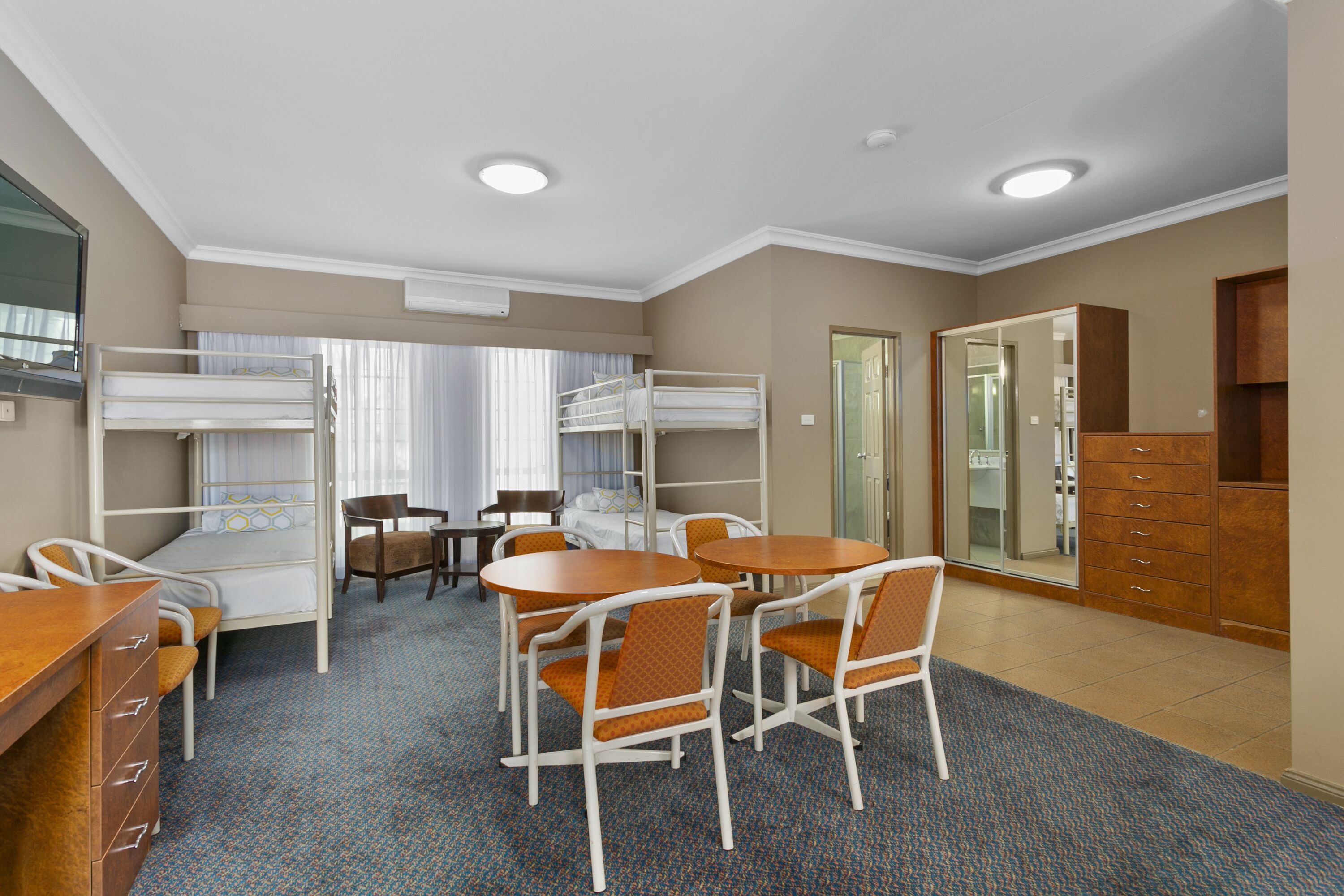 standard room, multiple beds, non smoking | in-room safe, desk, laptop workspace, iron/ironing board