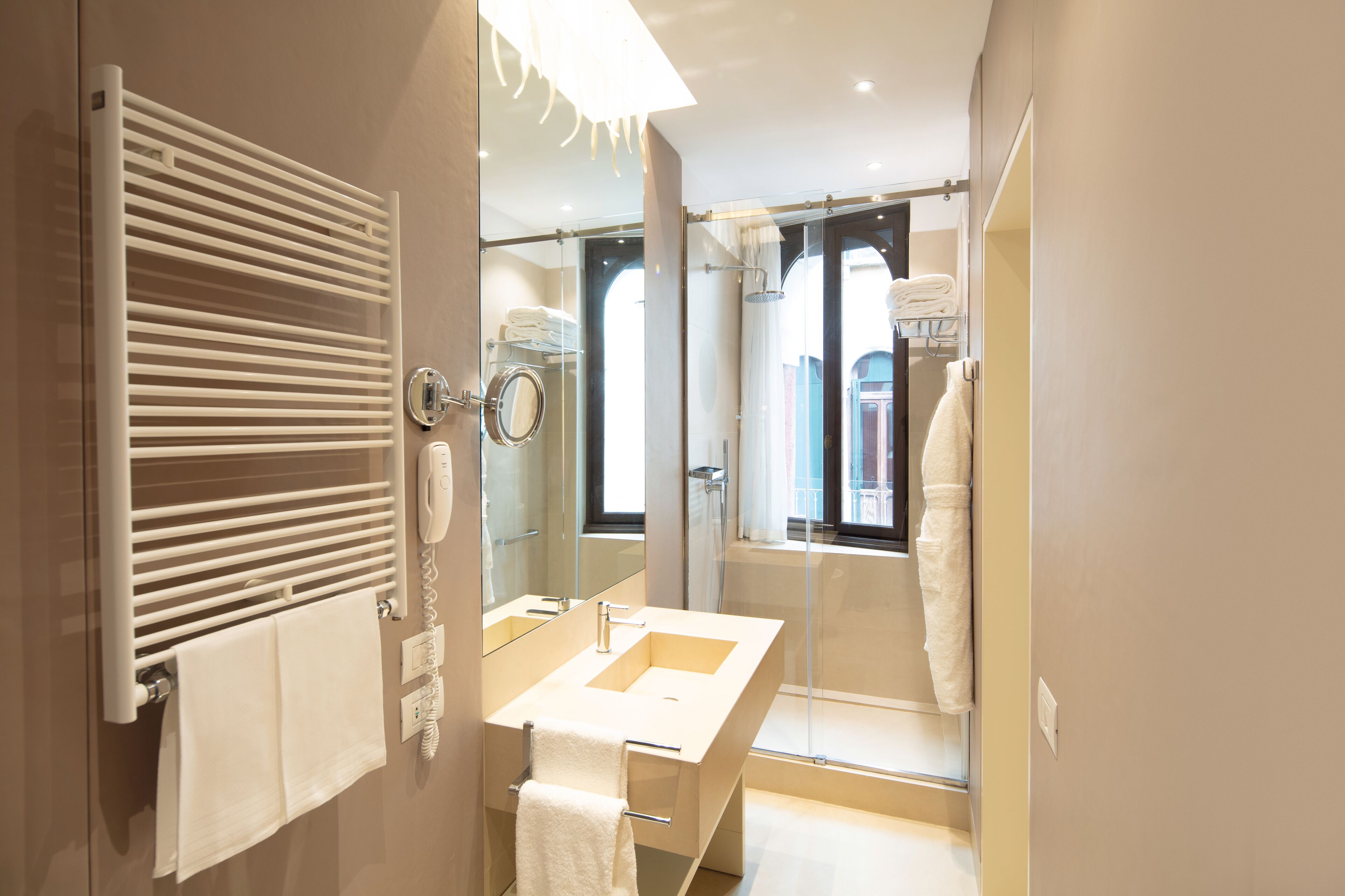 rainfall showerhead, free toiletries, hair dryer, bathrobes