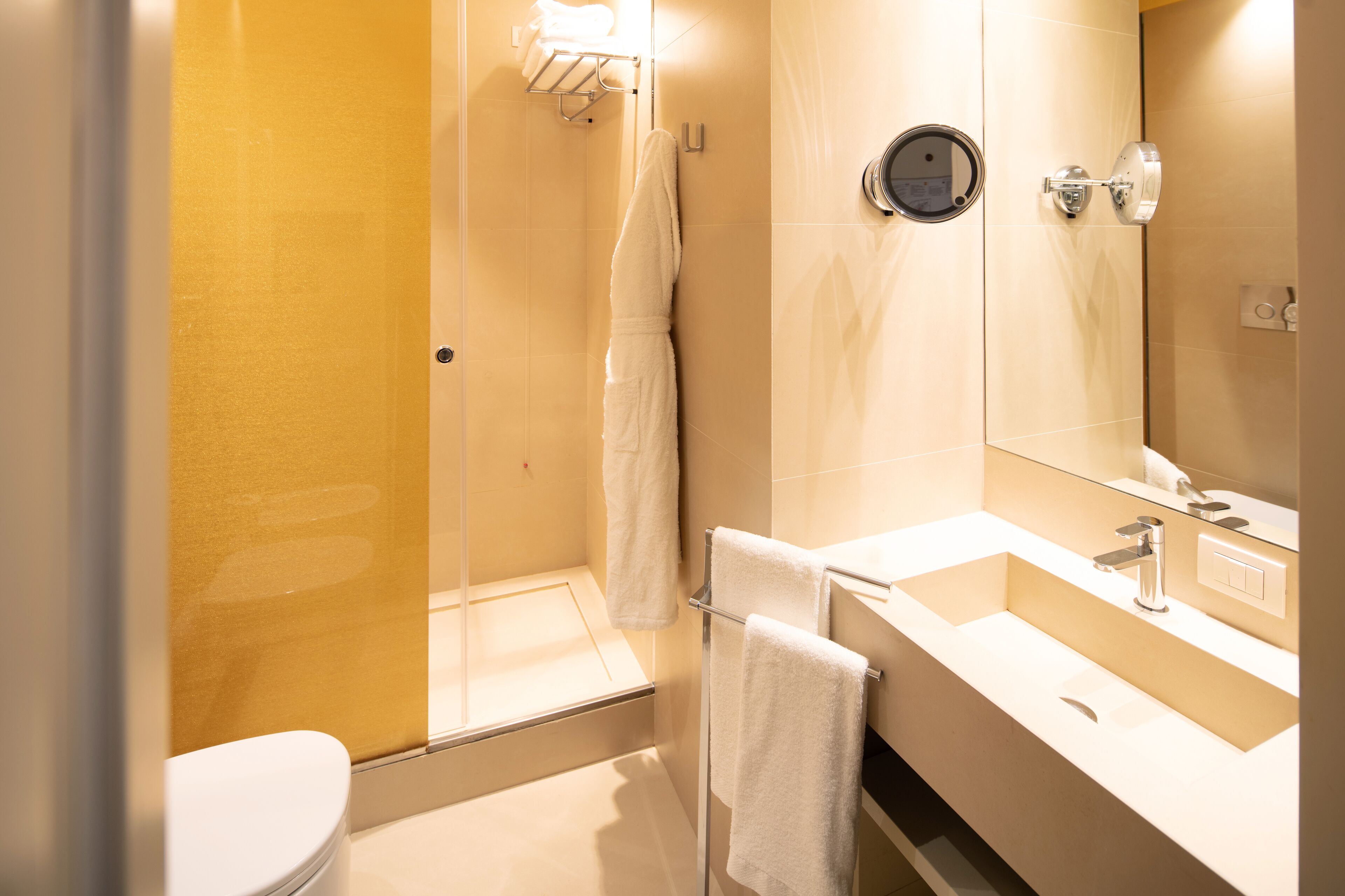 rainfall showerhead, free toiletries, hair dryer, bathrobes