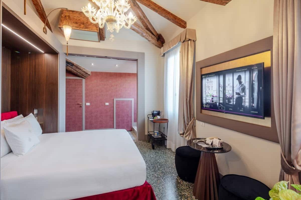 Junior Suite, Terrace | 1 bedroom, down comforters, minibar, in-room safe