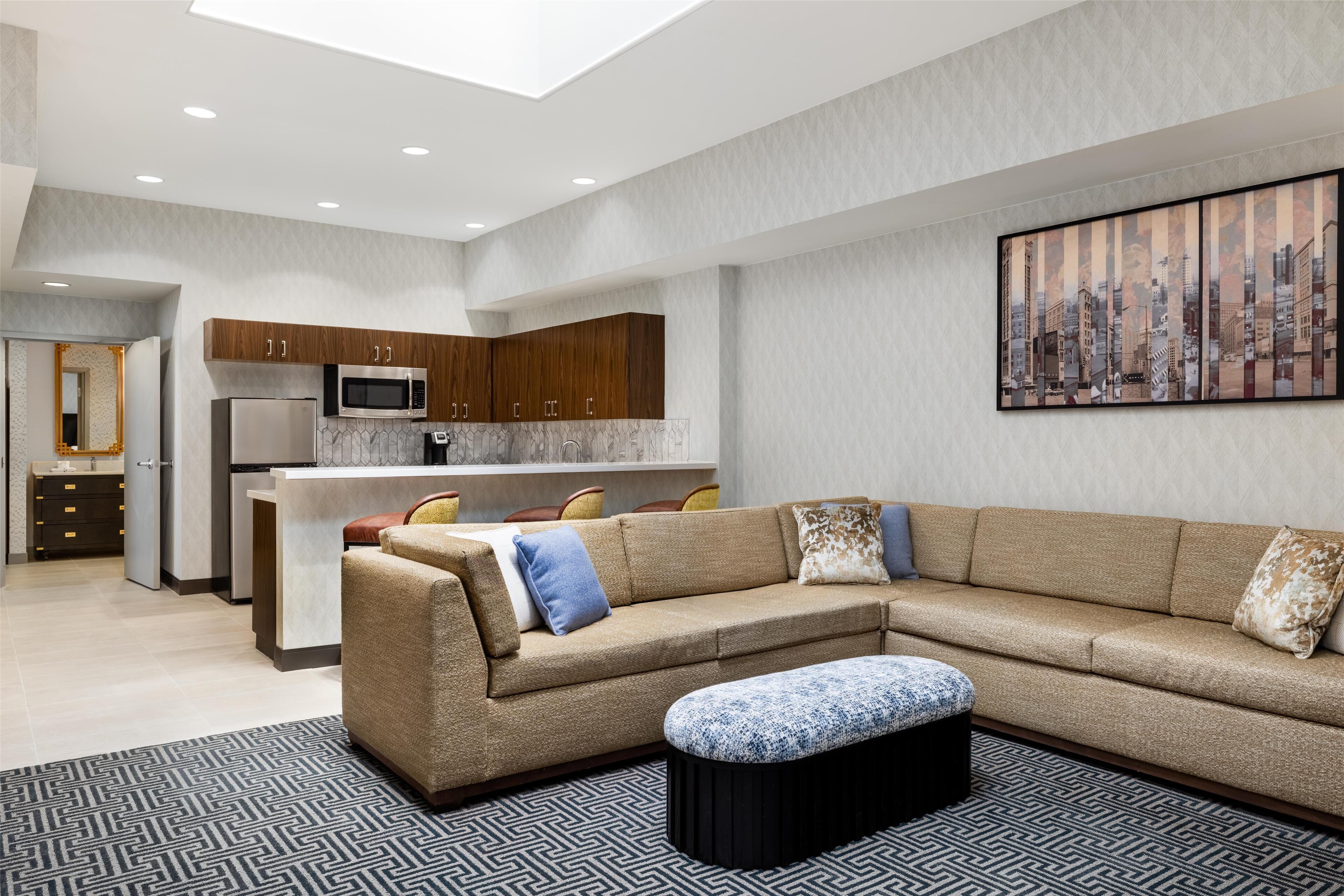 premier suite, 1 king bed | living area | 55-inch lcd tv with digital channels, tv, ipod dock