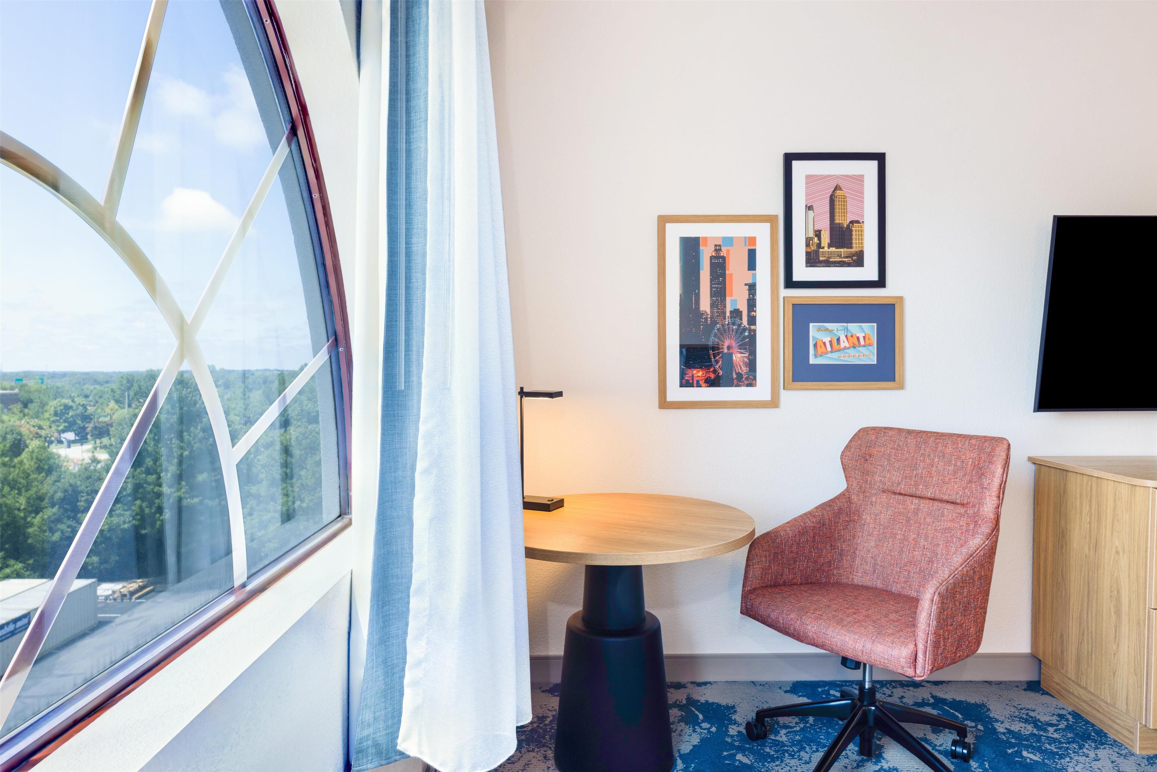 room, 1 king bed with sofa bed, refrigerator & microwave | in-room safe, desk, blackout curtains, iron/ironing board