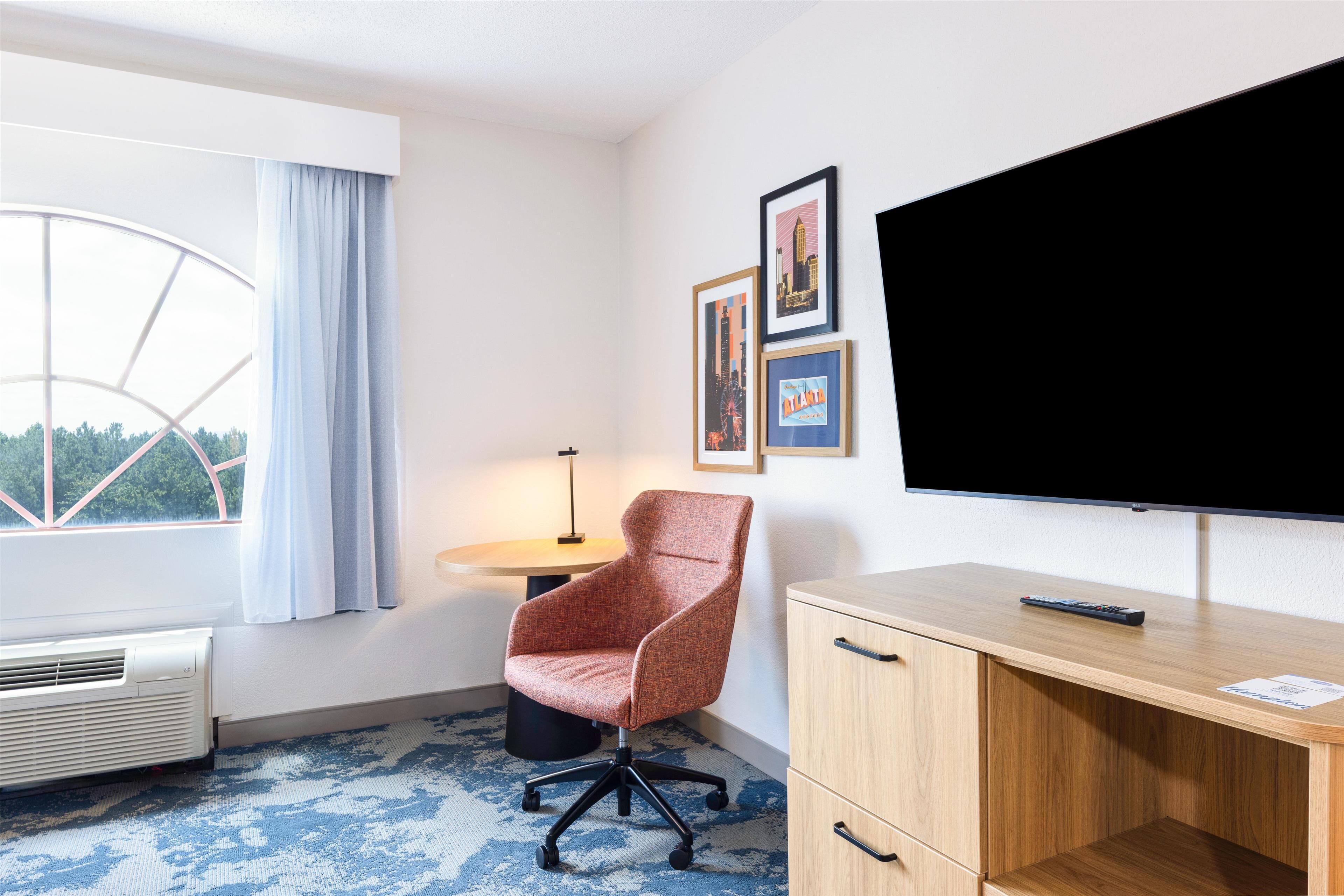 room, 1 king bed with sofa bed, refrigerator & microwave | in-room safe, desk, blackout curtains, iron/ironing board