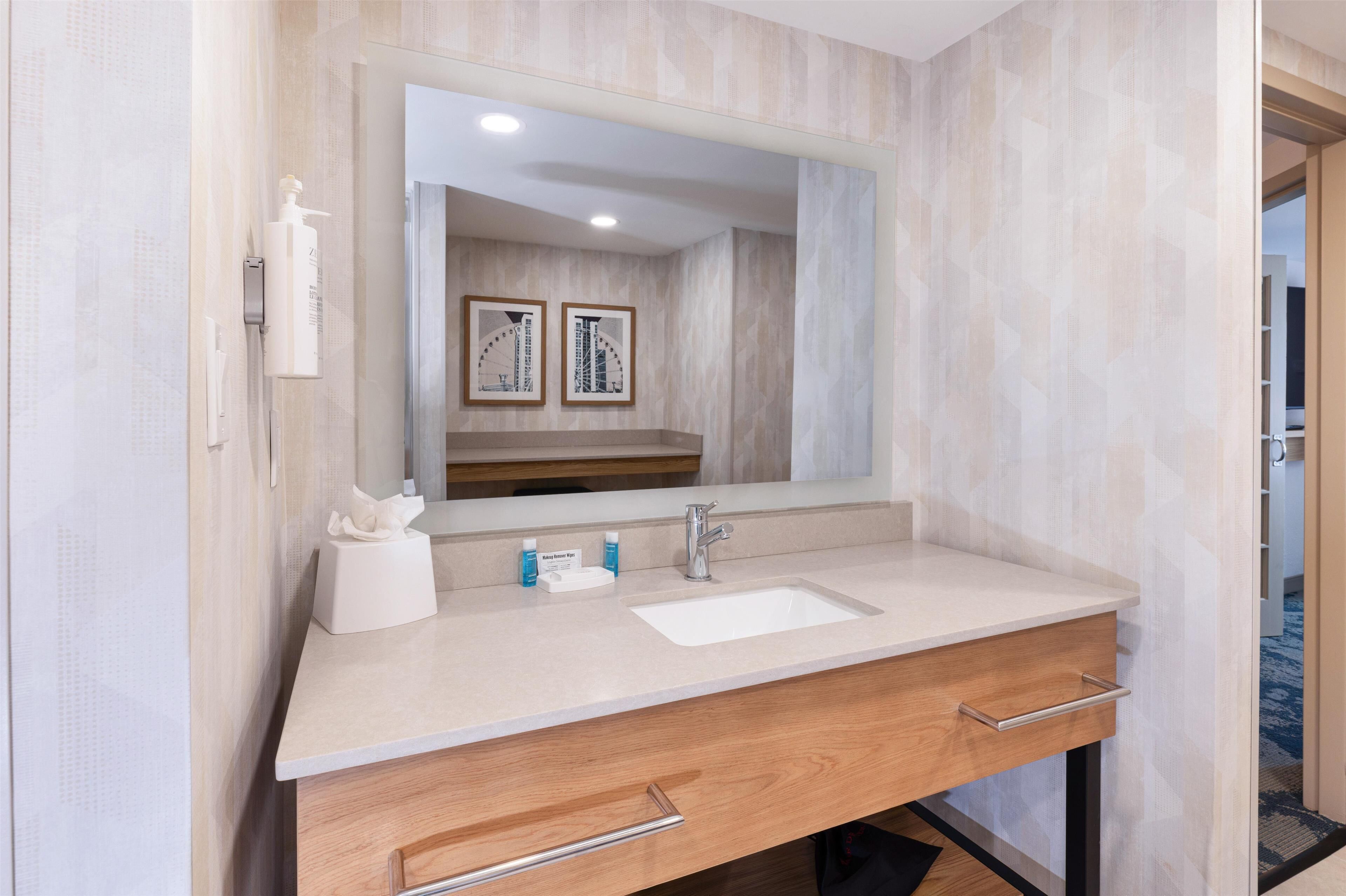 suite, 1 king bed, non smoking, refrigerator & microwave (wet bar) | bathroom | combined shower/bathtub, free toiletries, hair dryer, towels