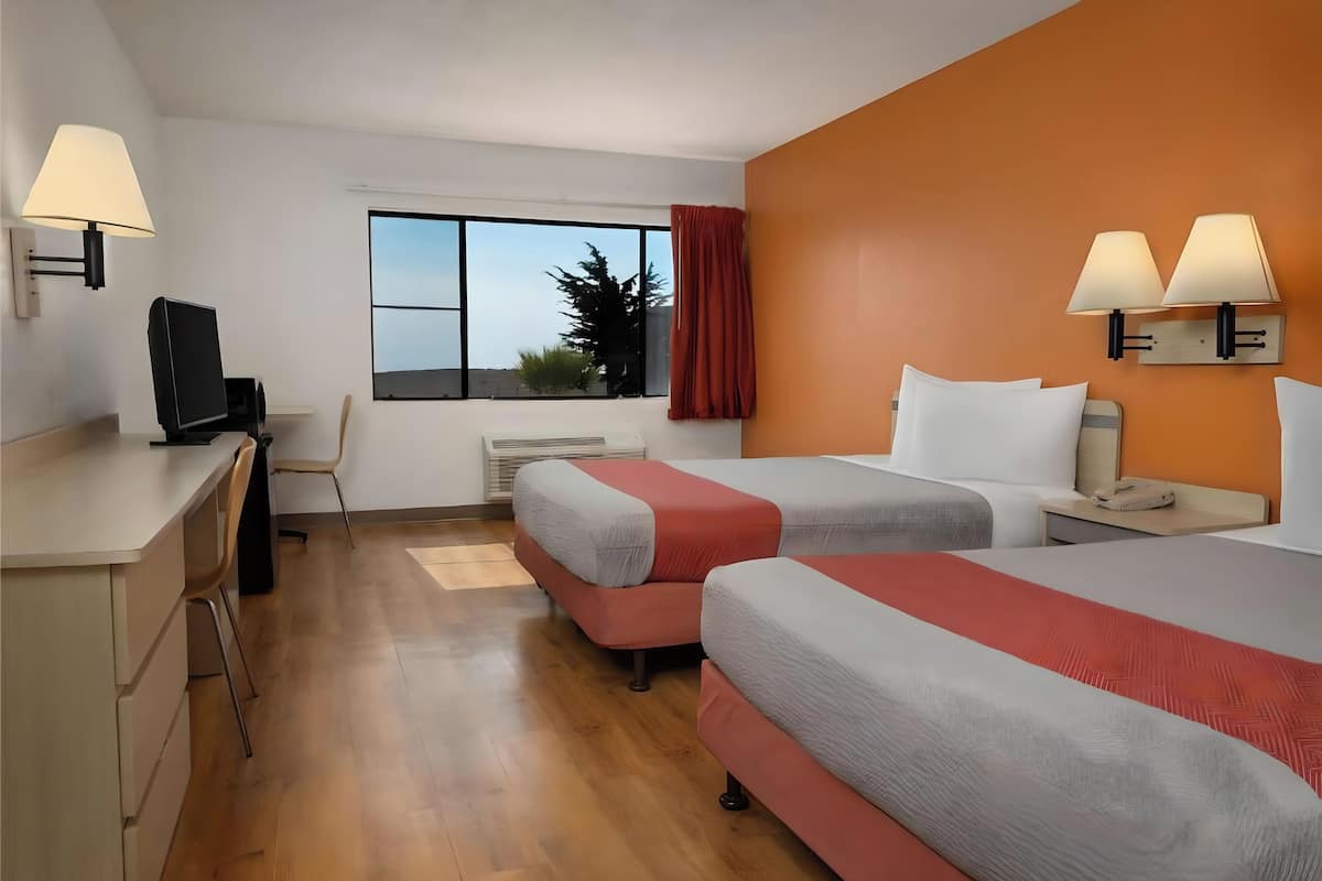 Desk, blackout curtains, free WiFi, bed sheets