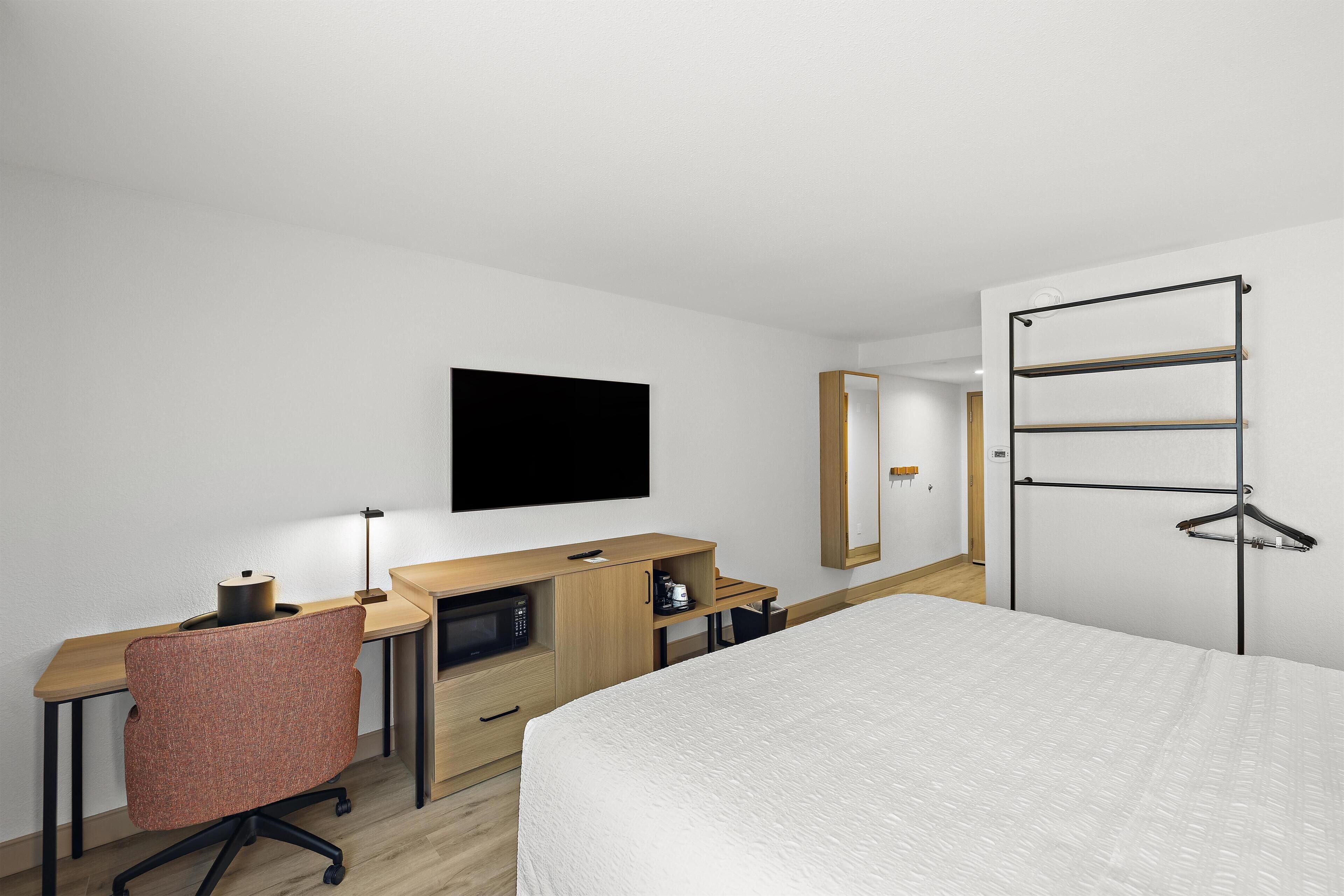 Desk, blackout drapes, WiFi (free), bed sheets