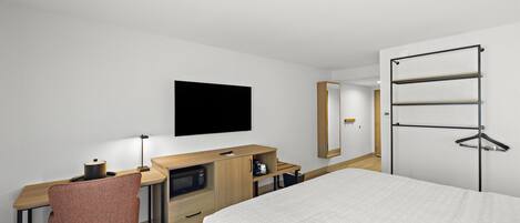 Desk, blackout drapes, WiFi (free), bed sheets
