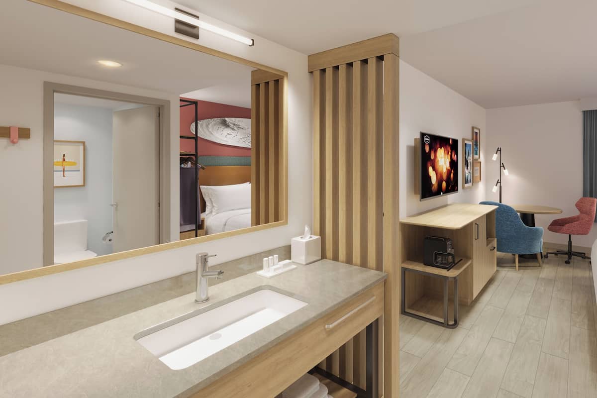 Escritorio, cortinas blackout, wifi gratis y ropa de cama