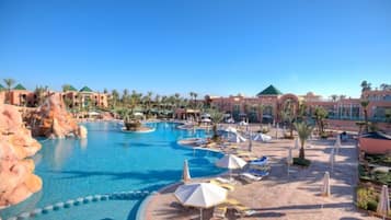 Indoor pool, outdoor pool, pool umbrellas, pool loungers