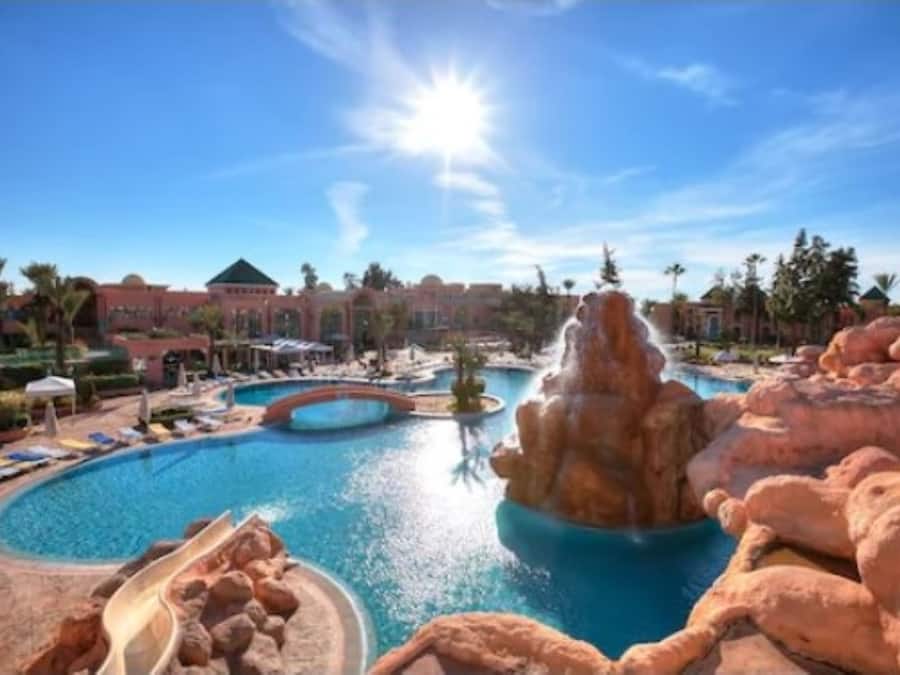 Indoor pool, outdoor pool, pool umbrellas, sun loungers