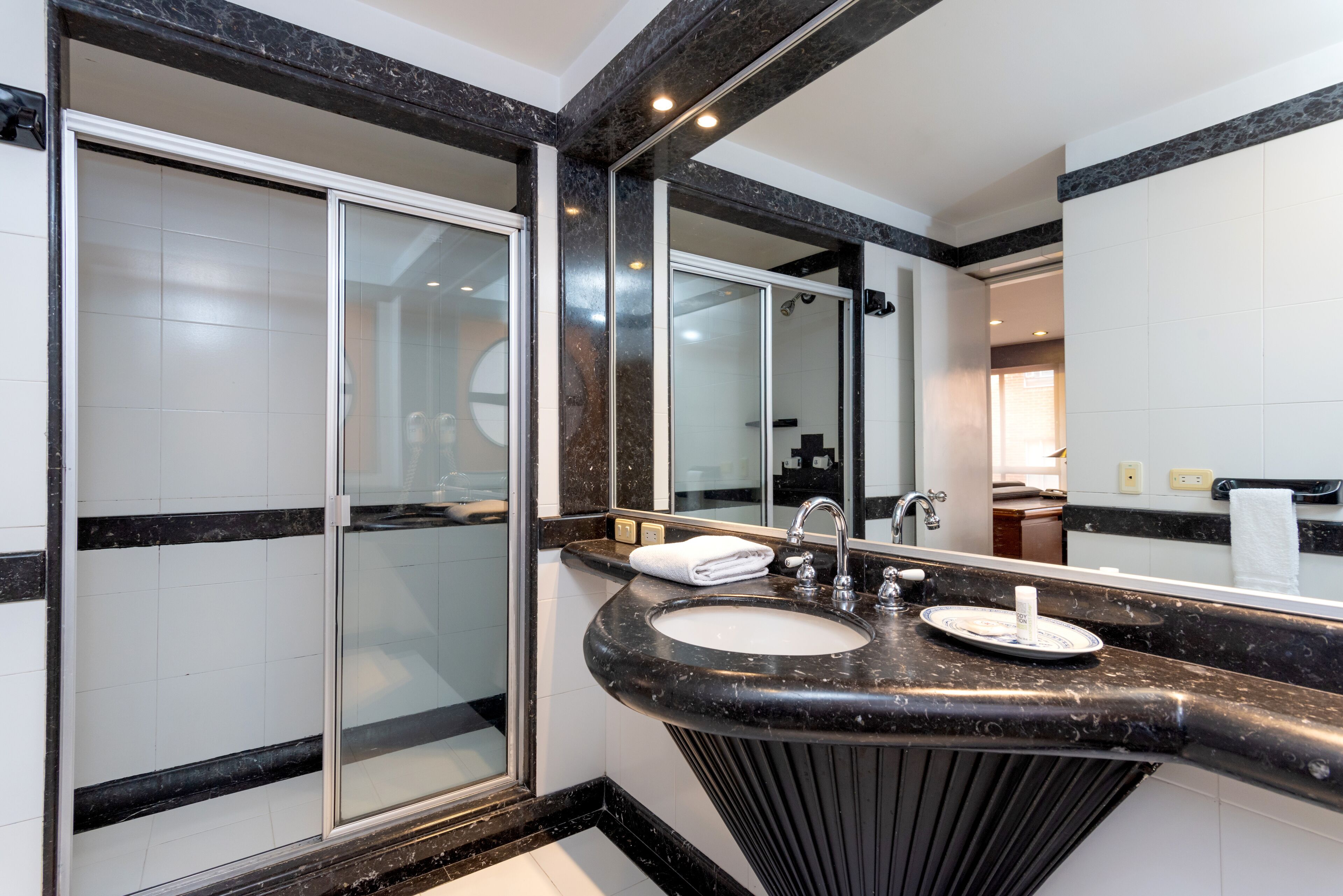 studio suite, 1 queen bed with sofa bed | bathroom | free toiletries, hair dryer, towels, soap