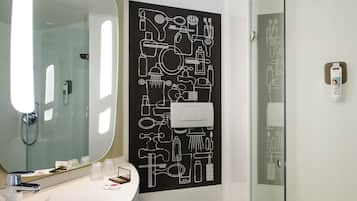 Shower, eco-friendly toiletries, hair dryer, towels