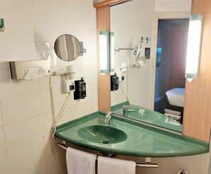 Shower, eco-friendly toiletries, hair dryer, towels