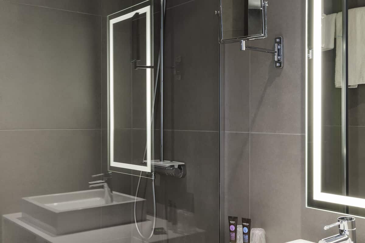 shower, eco-friendly toiletries, hair dryer, towels