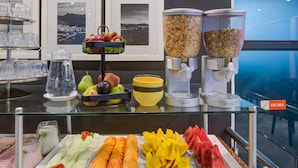 A buffet with various fruits, vegetables, and cereals. - Rio Design Copacabana Hotel (Rio de Janeiro)