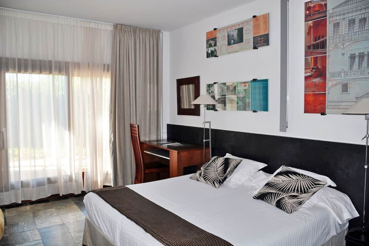Down comforters, minibar, in-room safe, individually furnished