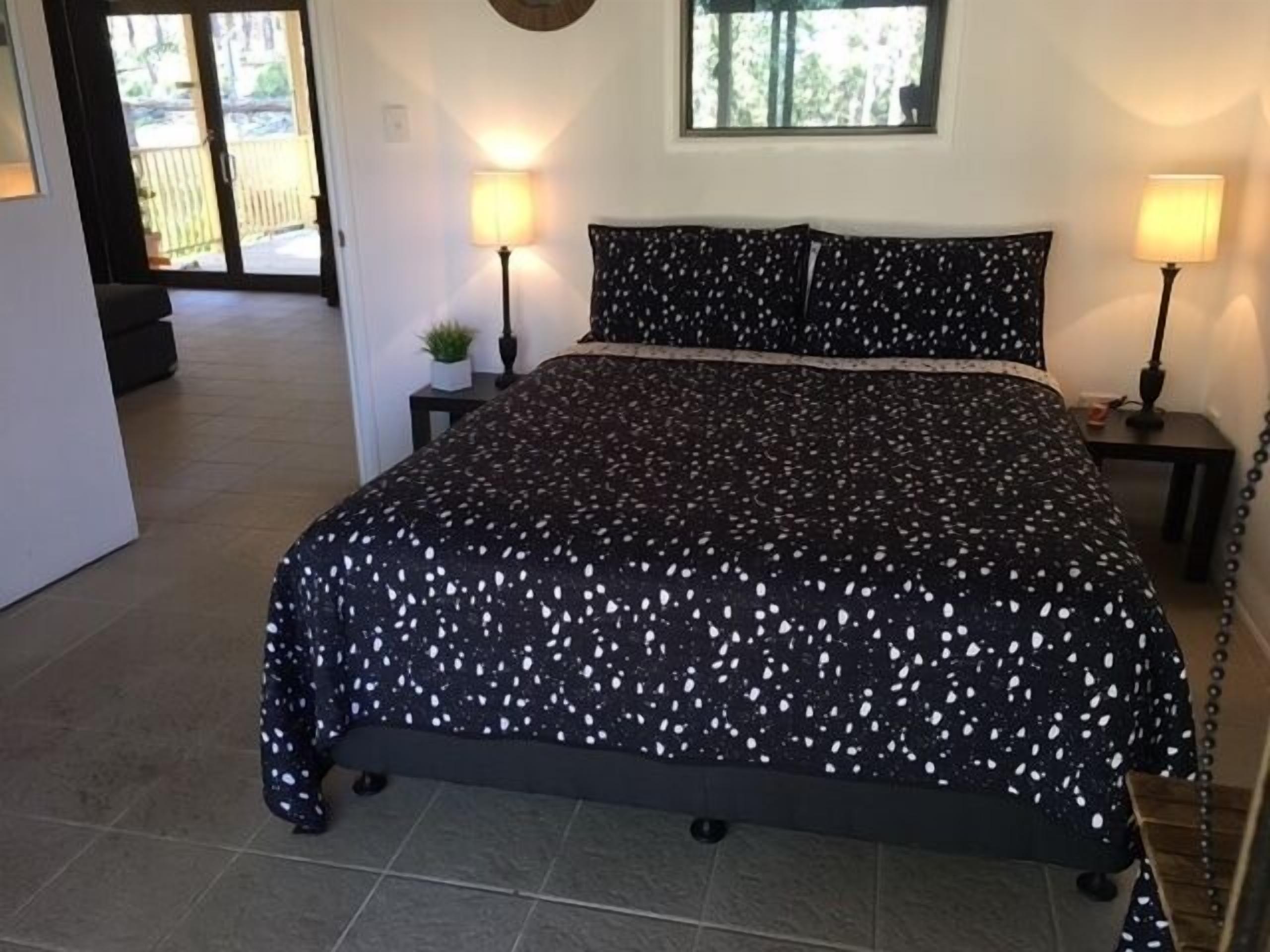 corroboree spa cabin | 1 bedroom, individually furnished, iron/ironing board, bed sheets