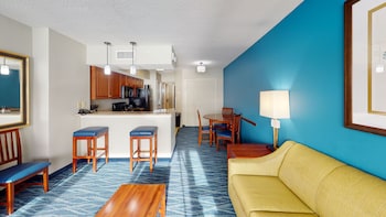 Suite, Oceanfront | Living area | 40-inch flat-screen TV with cable channels, TV at Dunes Village Resort