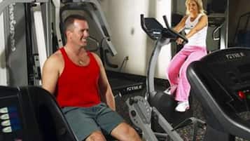 A gym with treadmills and exercise equipment.