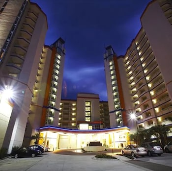 Front of property - evening/night at Dunes Village Resort