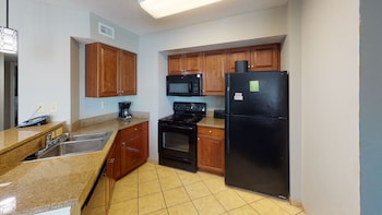 Basic Room, 3 Bedrooms, Partial Sea View (Angle) | Private kitchen | Full-size fridge, microwave, oven, stovetop at Dunes Village Resort