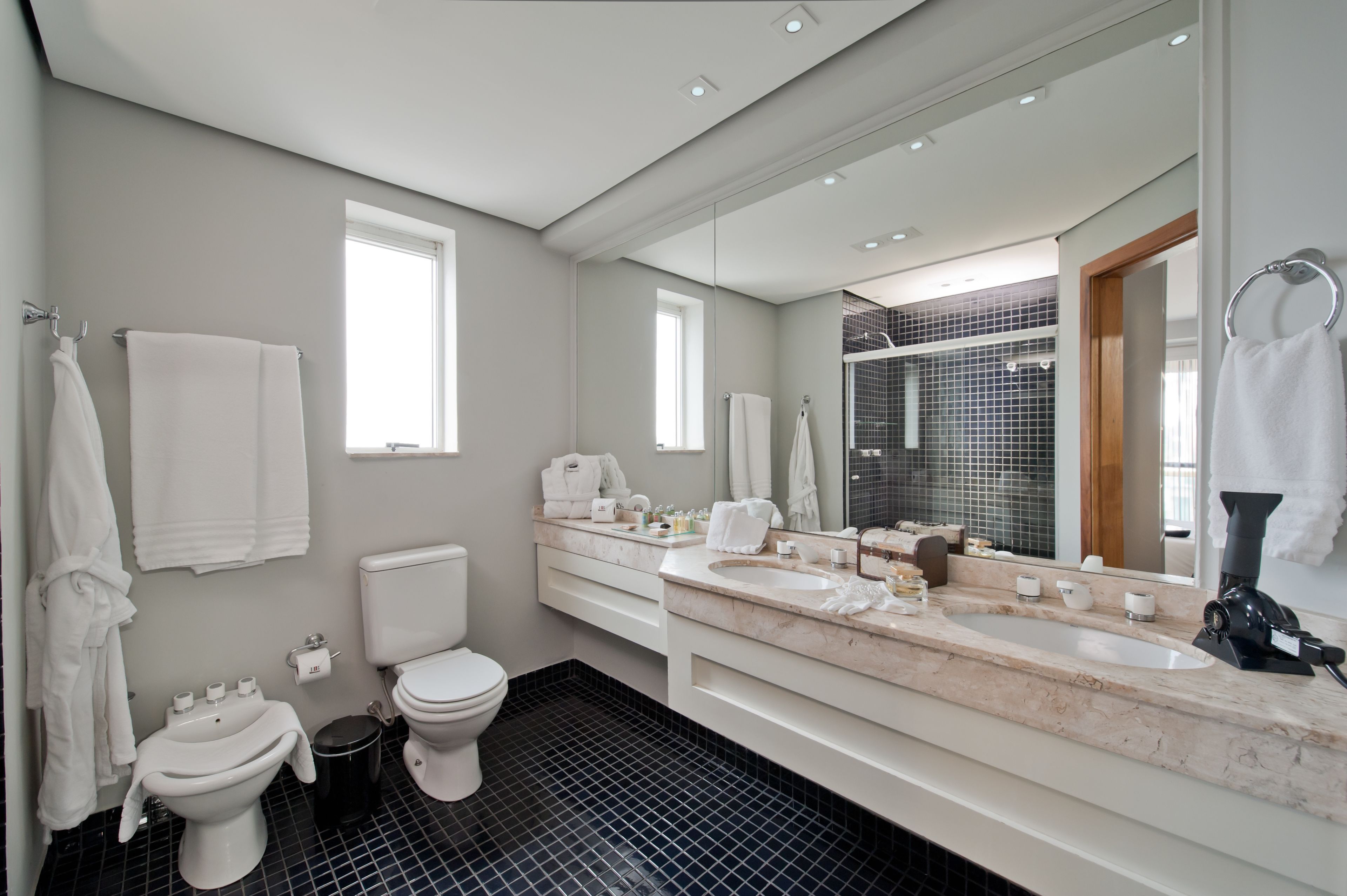 elite double room | bathroom | shower, hair dryer, towels
