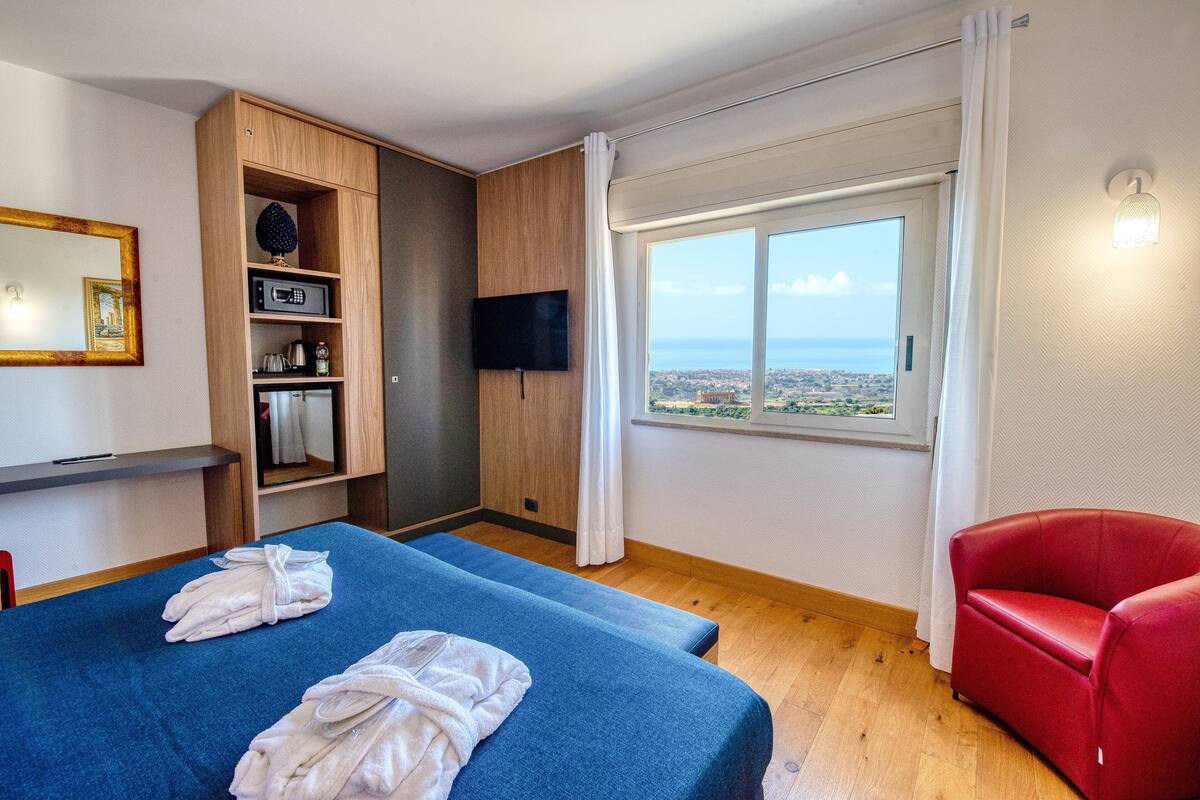 superior double room, valley view | minibar, in-room safe, desk, laptop workspace